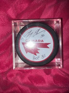 Gerry Cheevers autographed puck.